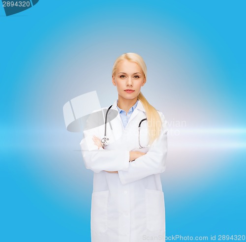 Image of serious female doctor with stethoscope