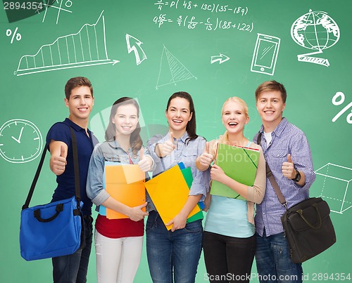 Image of group of smiling students showing thumbs up