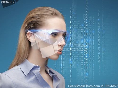 Image of businesswoman in virtual glasses