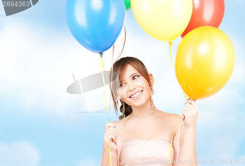 Image of happy teenage girl with balloons