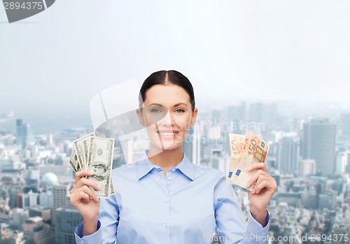 Image of businesswoman with dollar cash money