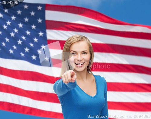 Image of smiling student pointing finger at you