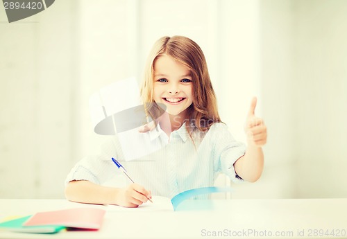 Image of student girl studying at school