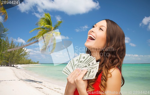 Image of woman in red dress with us dollar money