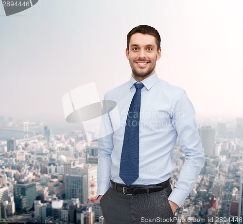Image of smiling young and handsome businessman