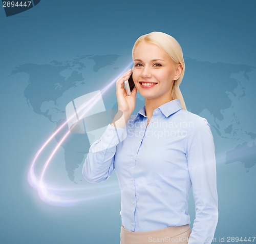 Image of businesswoman with smartphone over blue background