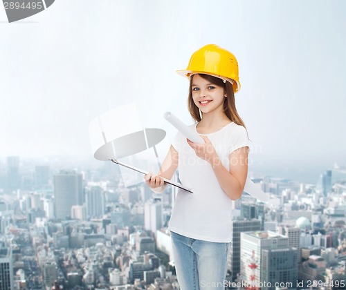 Image of smiling little girl in protective helmet