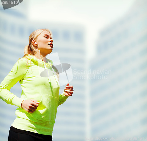 Image of woman doing running outdoors
