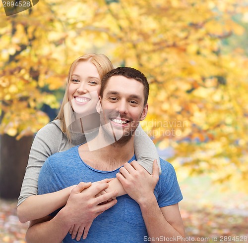 Image of smiling couple hugging