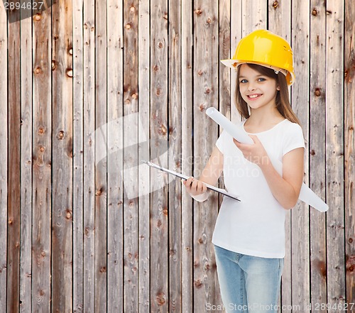 Image of smiling little girl in protective helmet