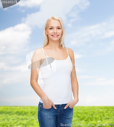 Image of smiling woman in blank white t-shirt