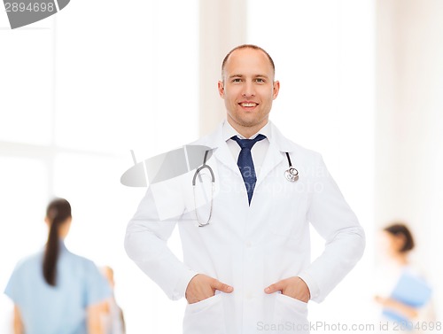 Image of smiling male doctor with stethoscope