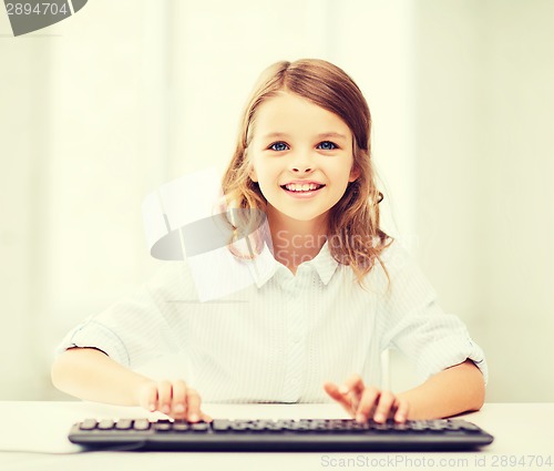 Image of student girl with keyboard