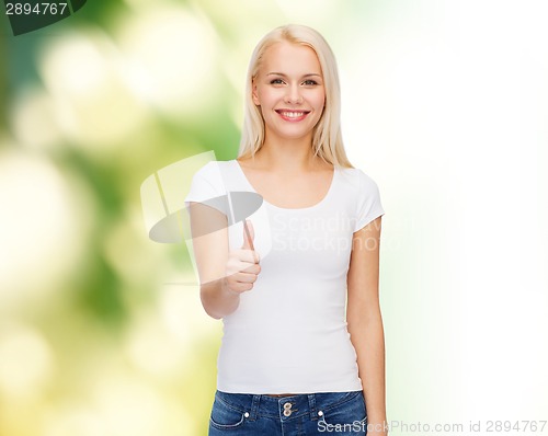 Image of woman showing thumbs up