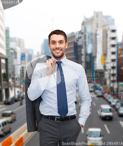 Image of smiling young and handsome businessman