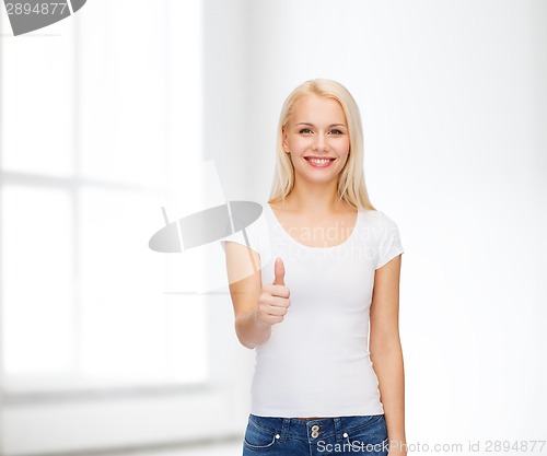 Image of woman showing thumbs up