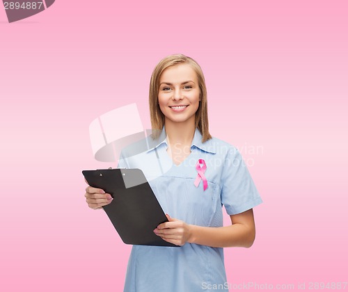 Image of female nurse with stethoscope and clipboard