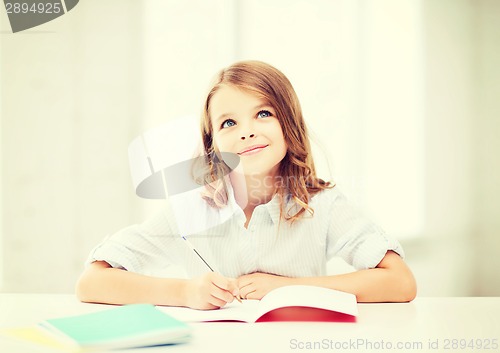 Image of student girl studying at school