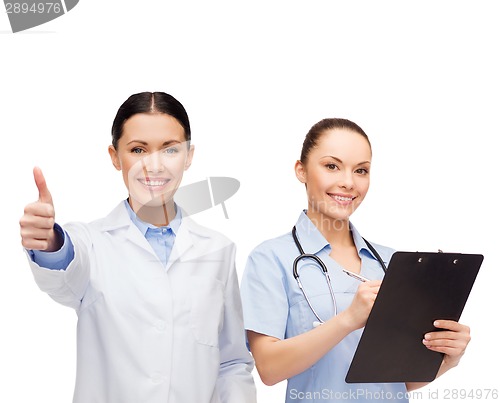 Image of smiling female doctor and nurse