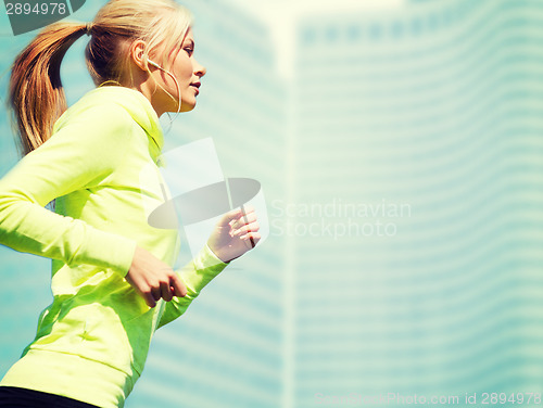 Image of woman doing running outdoors