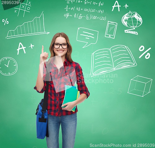 Image of smiling student girl showing thumbs up