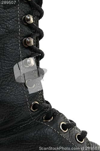 Image of Closeup of black leather boot