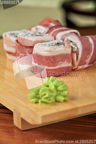 Image of Sushi roll with bacon