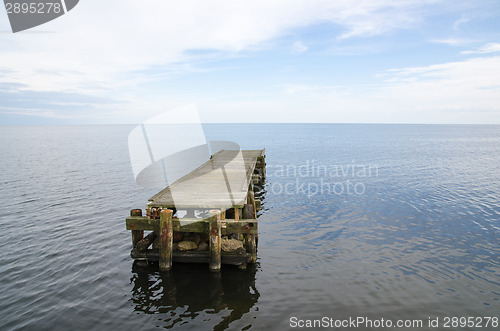Image of Deserted jetty surrounded by the water