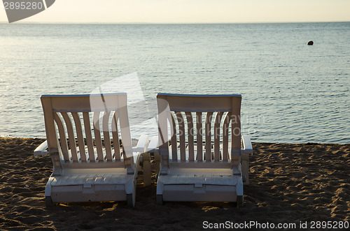 Image of Two armchairs at beach