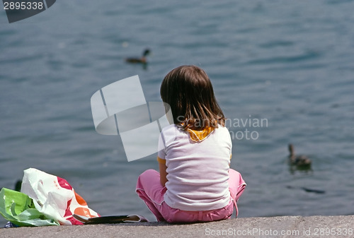 Image of Girl by lake