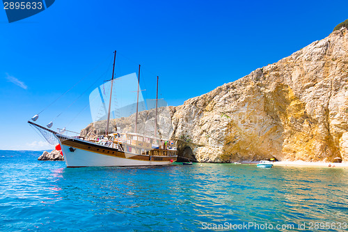 Image of Vintage sailing boat in bay.