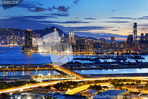 Image of Urban downtown city at sunset,