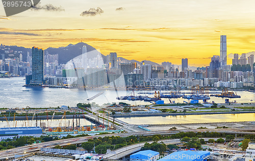 Image of Urban downtown city at sunset,