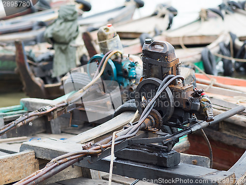 Image of Primitive boat engines in Myanmar