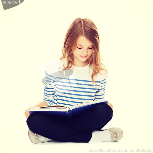 Image of student girl studying and reading book