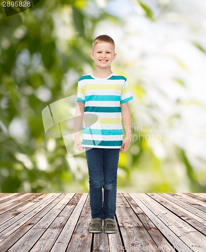 Image of smiling little boy in casual clothes