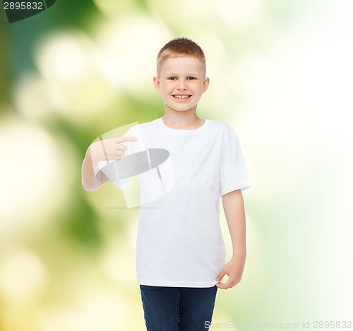 Image of smiling little boy in white blank t-shirt