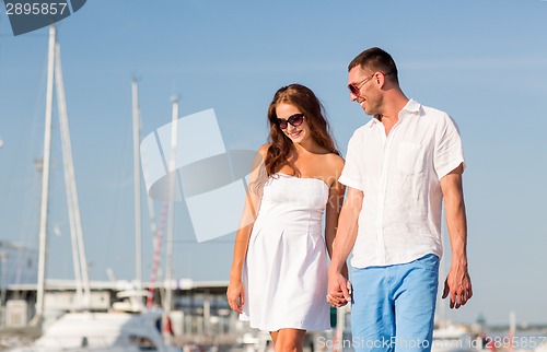 Image of smiling couple in city