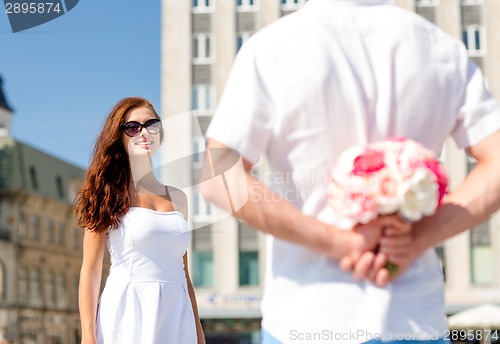Image of smiling couple in city