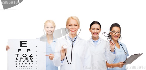 Image of smiling female eye doctors and nurses