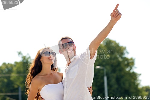 Image of smiling couple in park