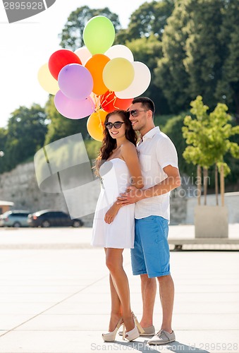 Image of smiling couple in city