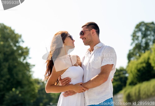 Image of smiling couple in city