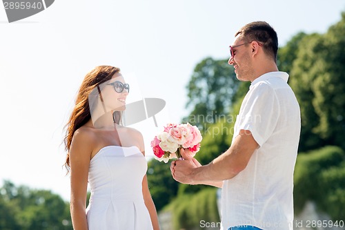 Image of smiling couple in city