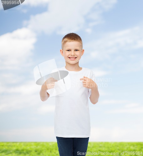 Image of smiling little boy in white blank t-shirt