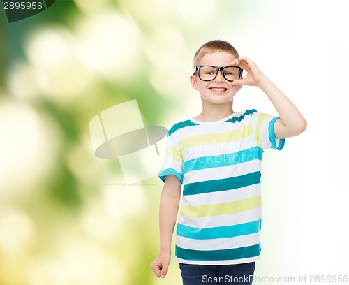 Image of smiling little boy in eyeglasses