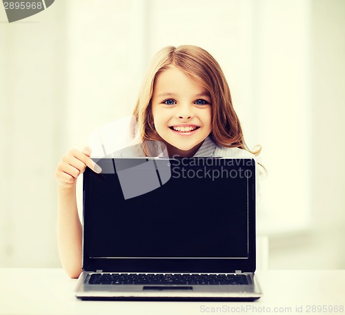 Image of girl with laptop pc at school