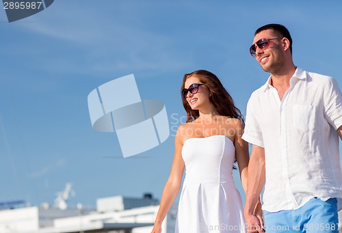 Image of smiling couple in city