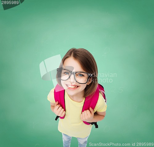 Image of happy smiling teenage girl in eyeglasses with bag