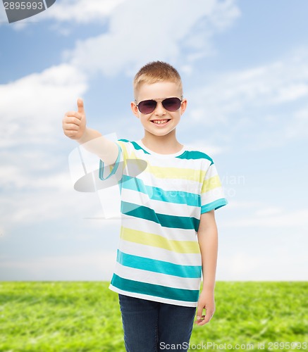 Image of smiling cute little boy in sunglasses